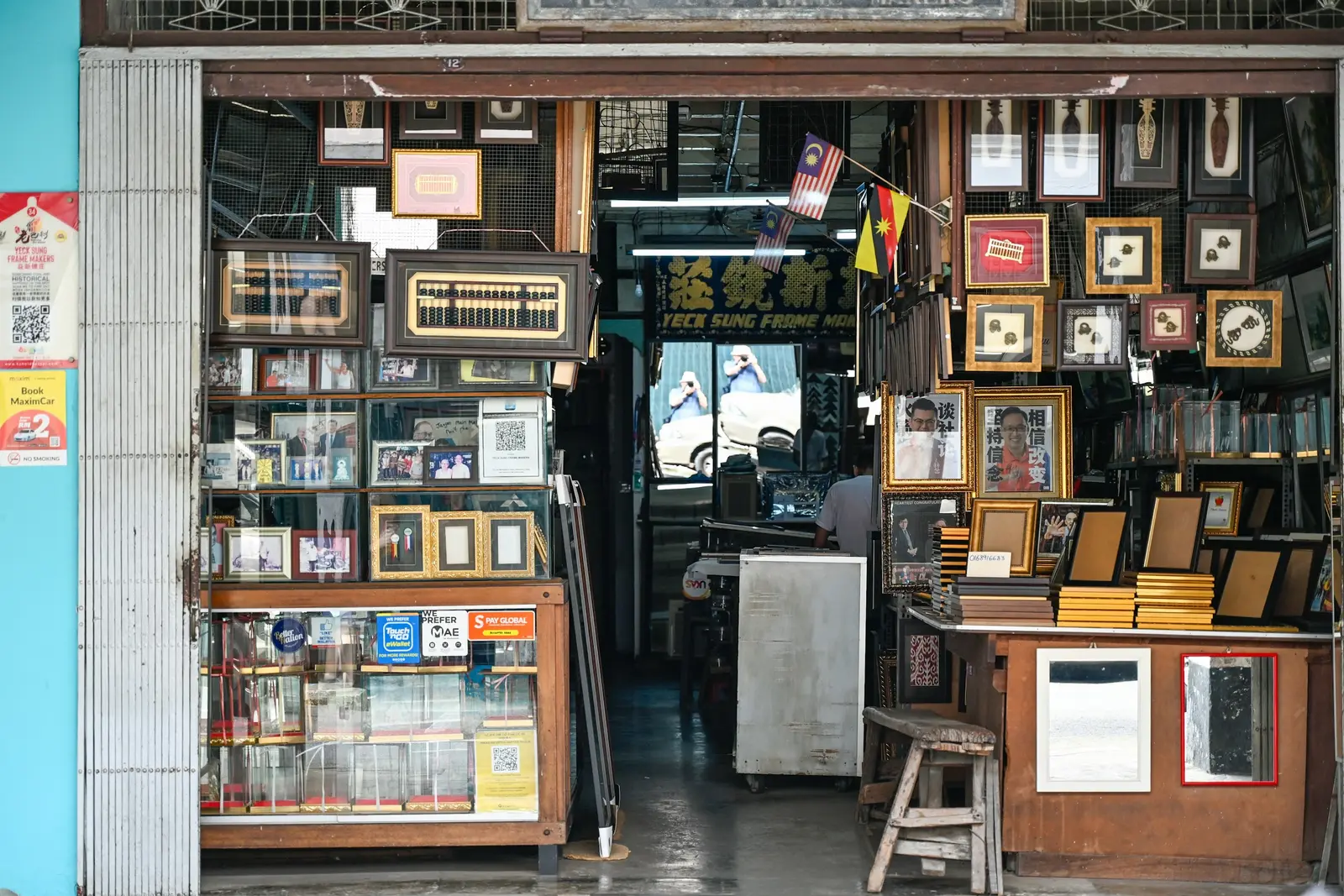 A small shop of framed pictures and curiosities in Kuching